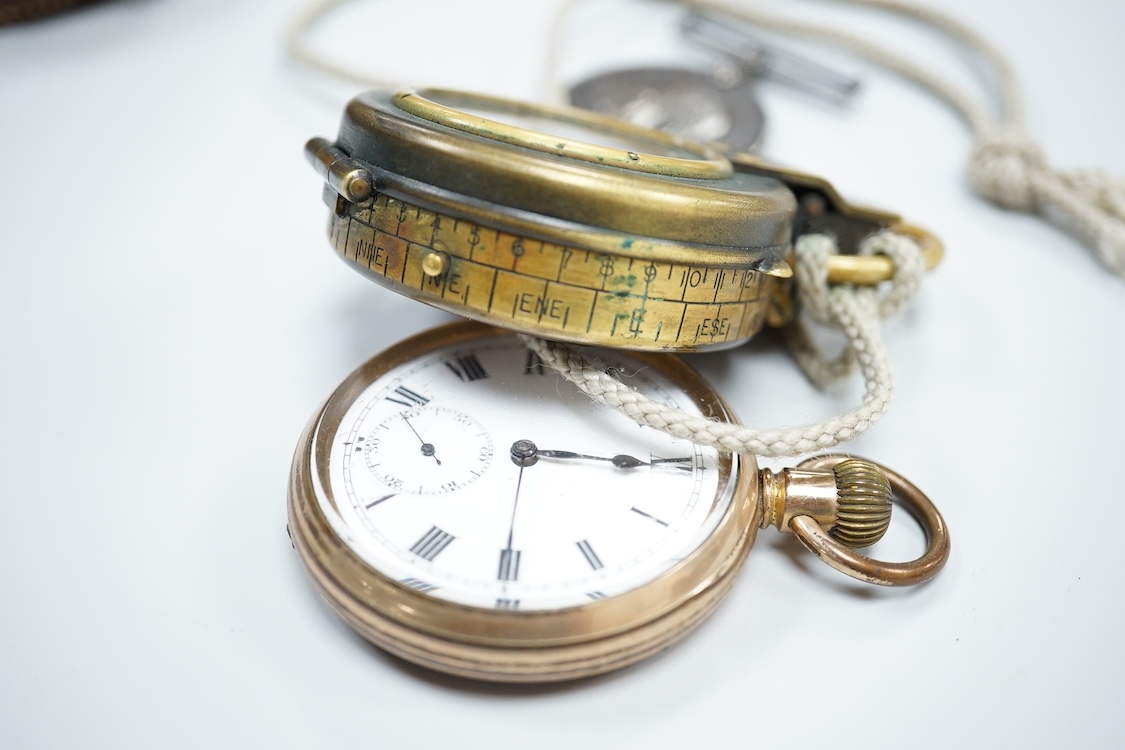 A cased WWI compass, an RG watch and a medal awarded to 33486 PTE. N. FRANCE. LING. R.